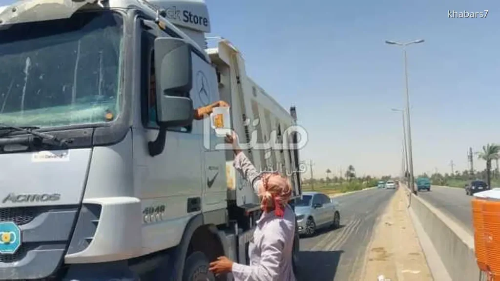 Local Man Provides Refreshing Relief to Travelers on Asyut Desert Road