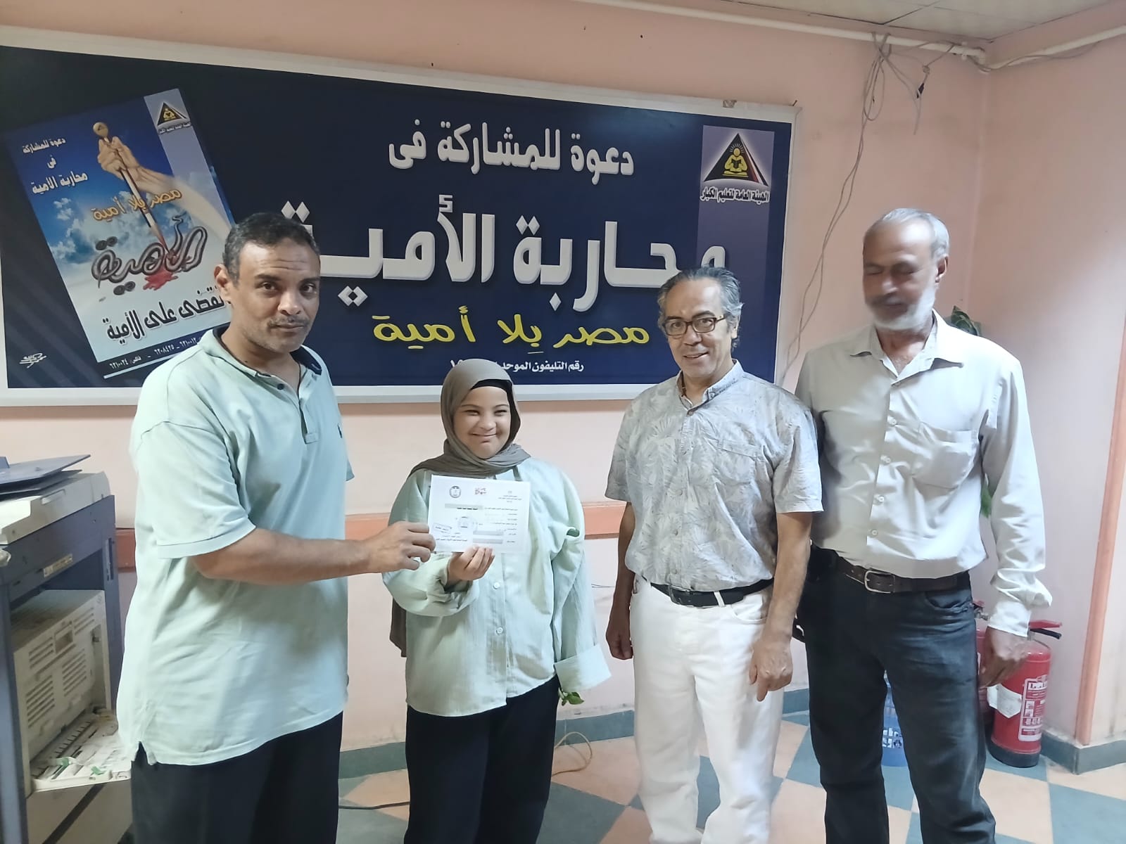 أسماء محمد من قنا تحصل على شهادة محو الأمية