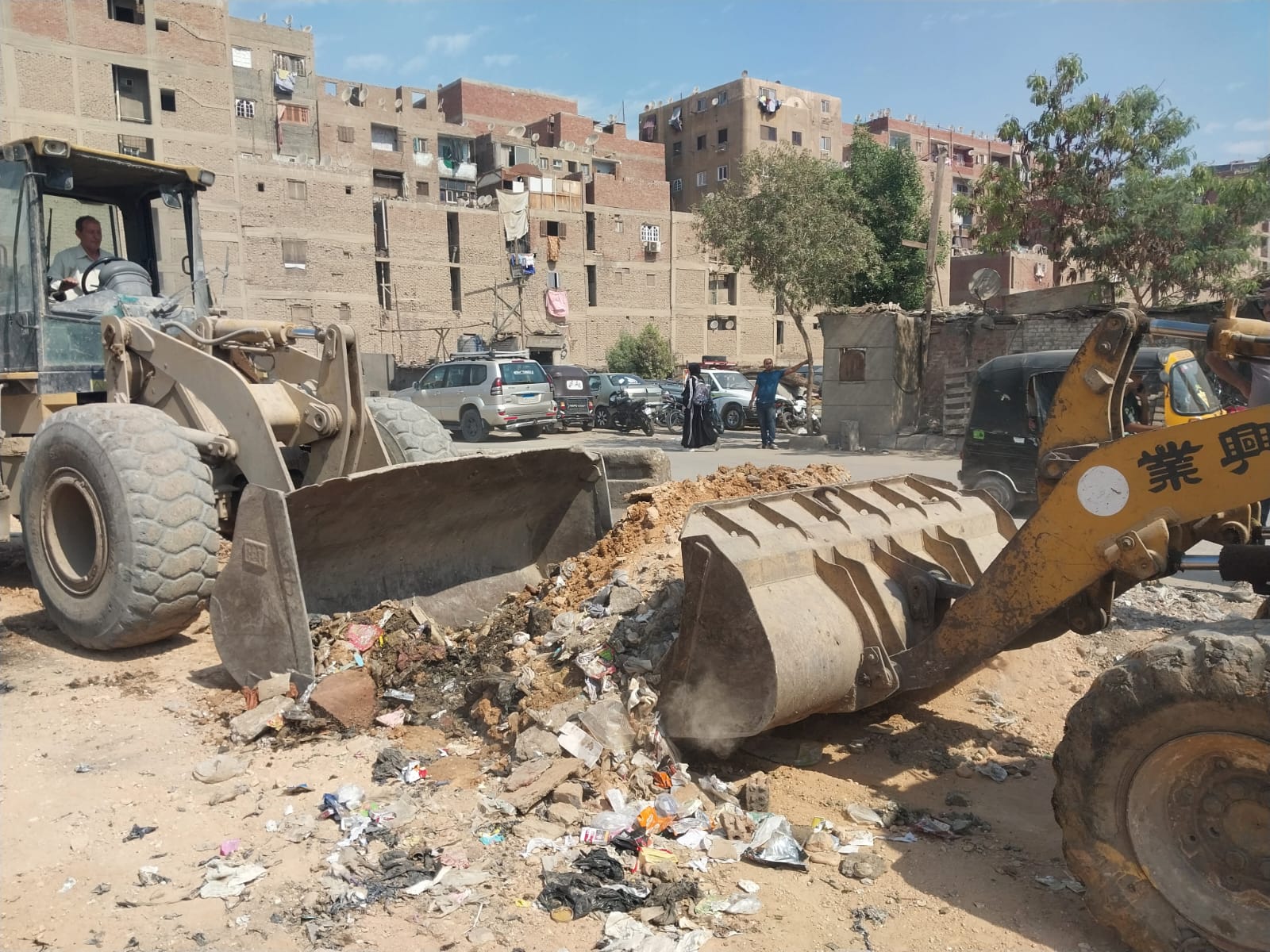 تطوير ورصف الشوارع ورفع كفاءة الخدمات ببولاق الدكرور تطوير ورصف الشوارع ورفع كفاءة الخدمات ببولاق الدكرور