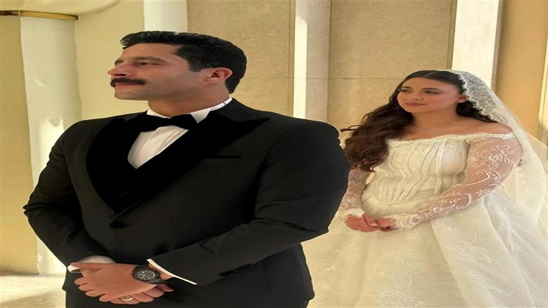 مصطفى منصور وهايدي رفعت
