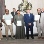 تسليم 8 عقود ملكية في أسوان ضمن قانون تقنين أراضي الدولة