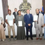 تسليم 8 عقود ملكية في أسوان ضمن قانون تقنين أراضي الدولة